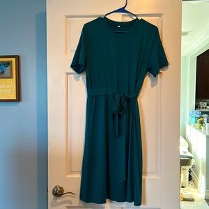 Beautiful, mid length, dress with a wrap waist, size small